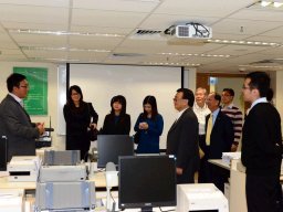 Mr Yuen briefing the delegates in a training room